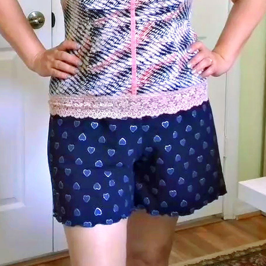 detail image of the shorts being worn with a blouse over