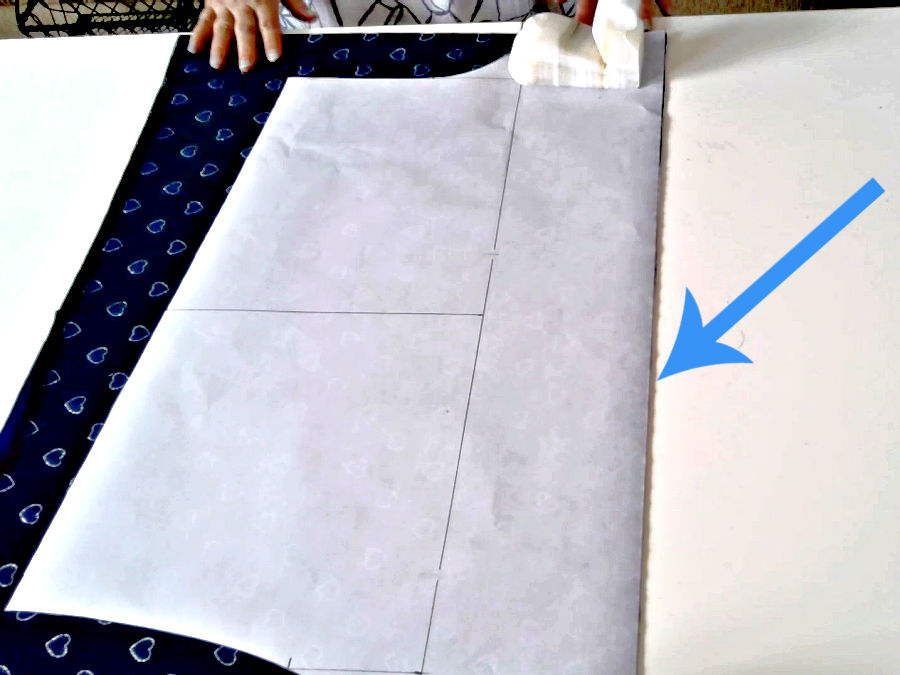 arranging the pattern on the fabric before cutting the pieces for the shiorts