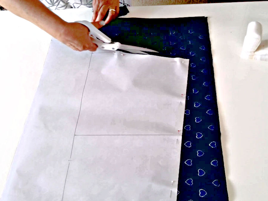 cutting the fabric for shorts from the pattern drafted previously