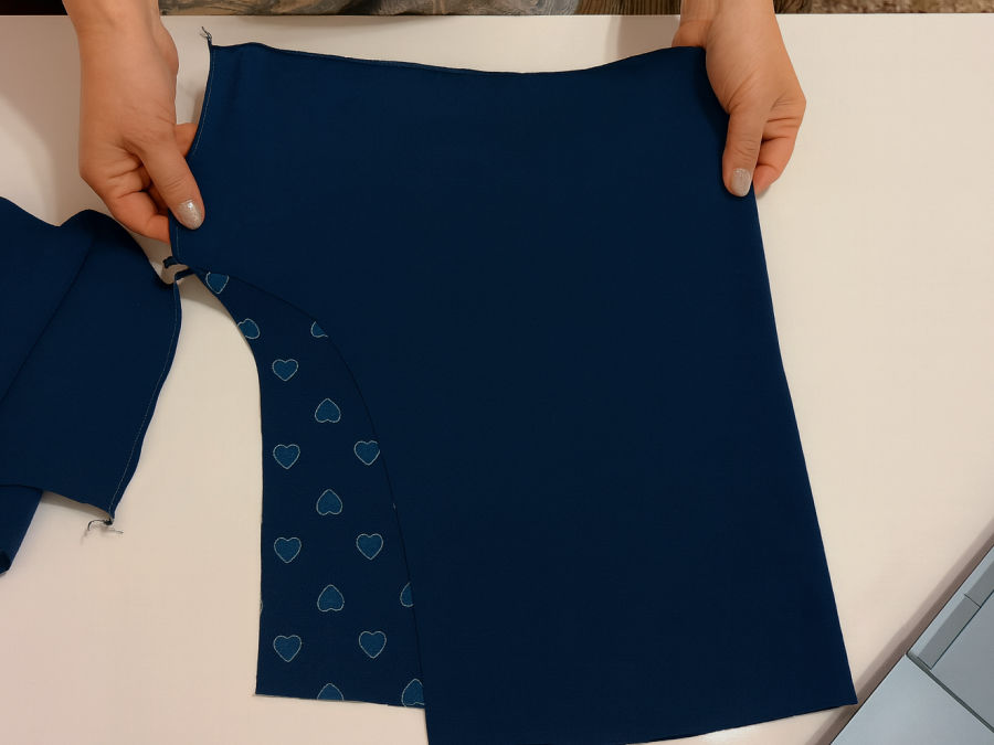 starting to sew the shorts place the two pieces together right side together on piece needs to be turned