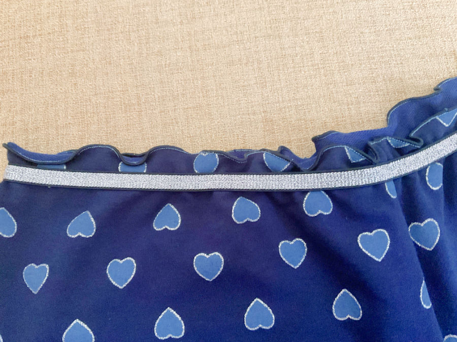 elastic over shorts waist