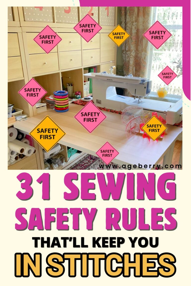 Sewing room with a modern sewing machine on a large wooden table, surrounded by colorful "safety first" signs. Organized storage shelves and crafting supplies are visible in the background. Bold text reads: "31 sewing safety rules that'll keep you in stitches" with the website ageberry.com at the bottom