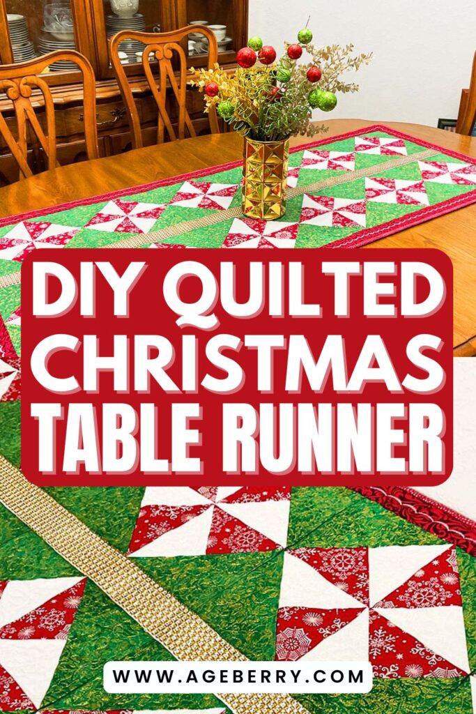 Quilted Christmas table runner in red, green, and white pinwheel blocks with gold accent strips displayed on a wooden dining table, topped with a gold vase holding festive red and green ornaments.