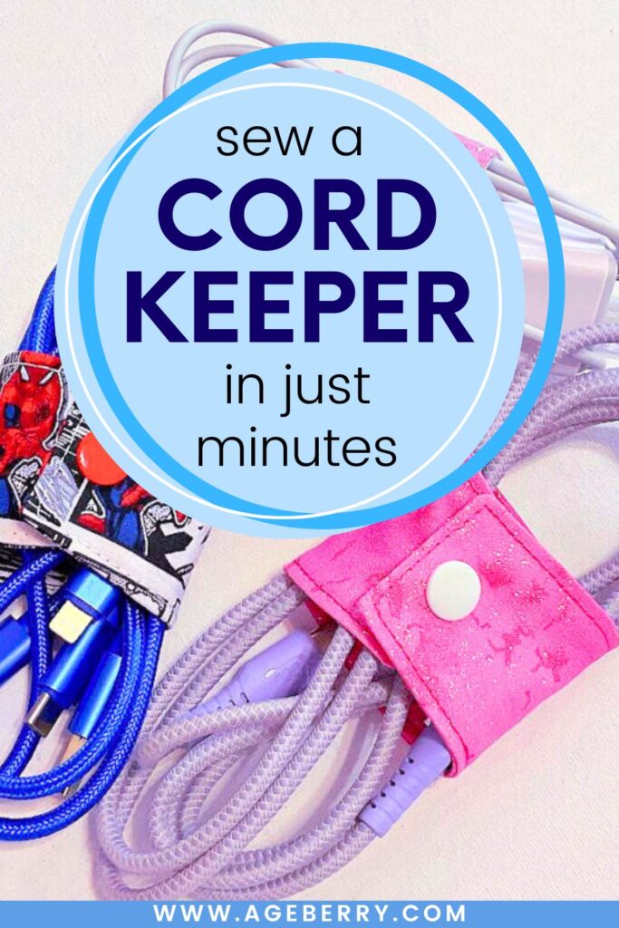 Close-up of three handmade fabric cord keepers with snap closures, two in pink fabric and one with a comic-style print, neatly holding charging cables.