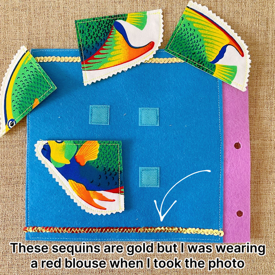 a page of the quiet book with a four color puzzle which needs to e assembled