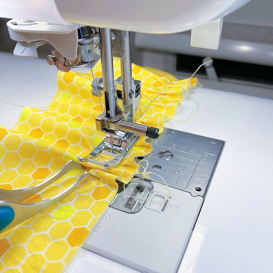 using tweezers for fabric gathering