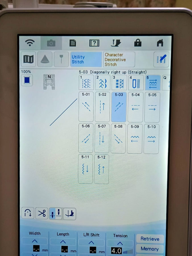 Screenshot of the brother luminaire screen showing the various directions the machine can stitch up down left right diagonally