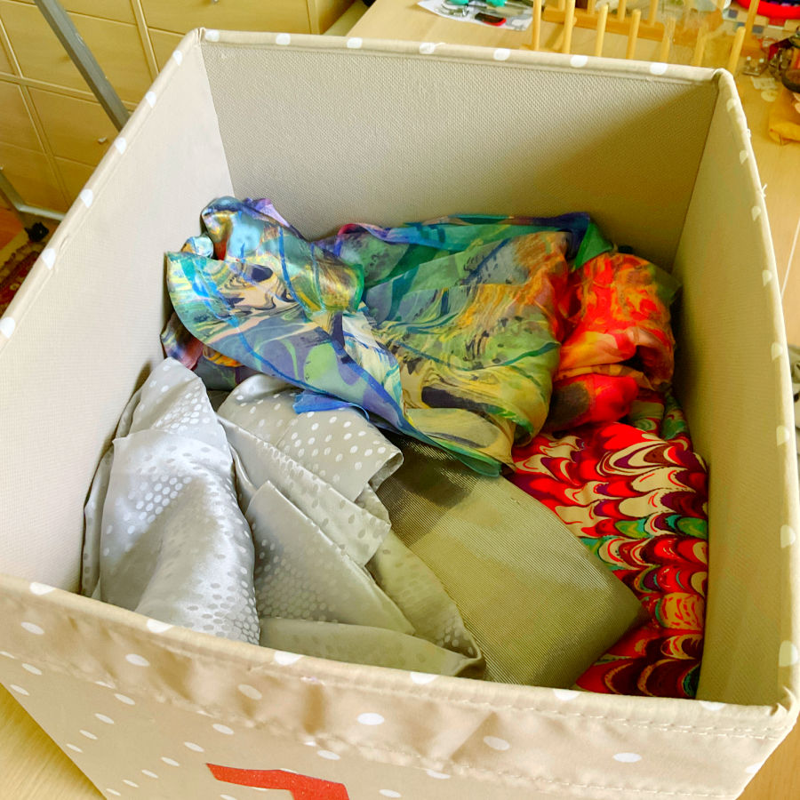 silk fabric stored in a storage box inside a kallax unit