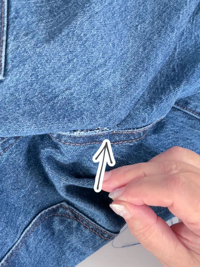 the rip in the jeans is closing after stitching manually