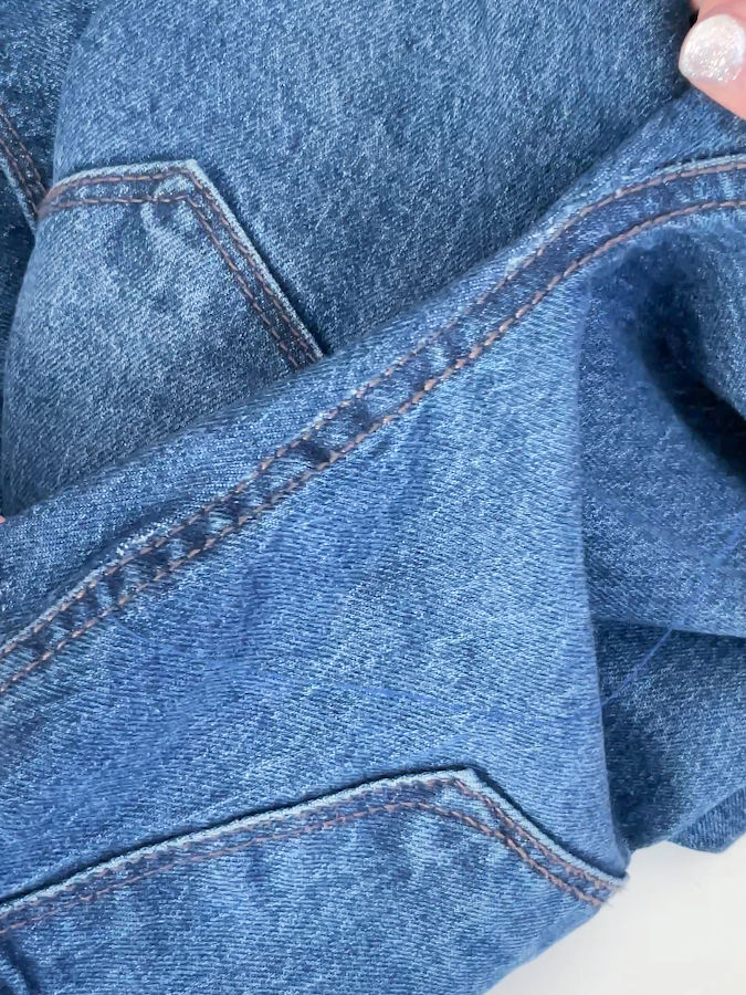 an image of the rip after the reinforcement stitch the initial rip is not visible anymore