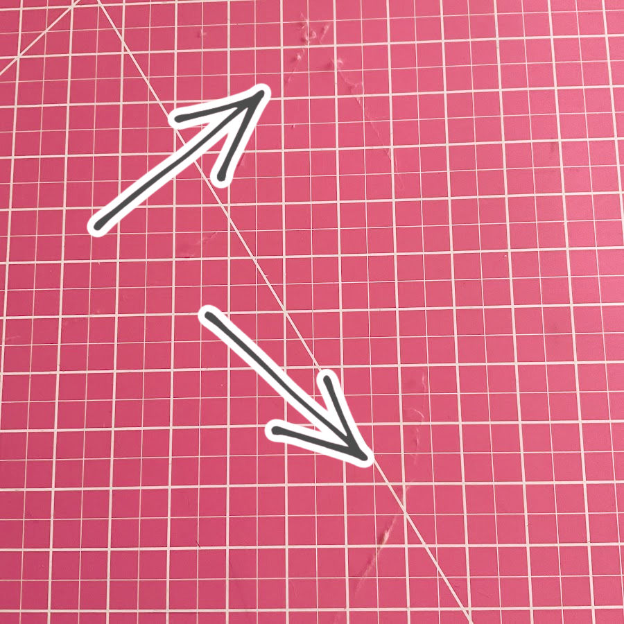 fibers from the fabric left over in the grooves of the self healing mat after cutting the material for the moon plushie