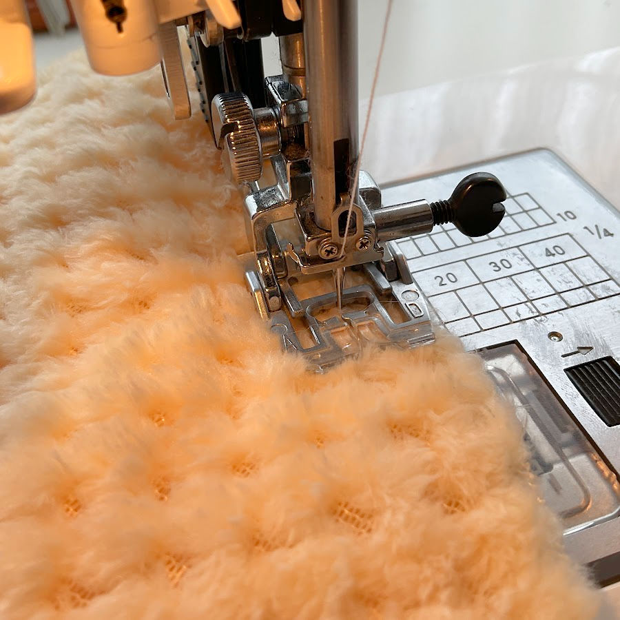 a janoime sewing machine while sewing a plush fabric using the built in walking foot