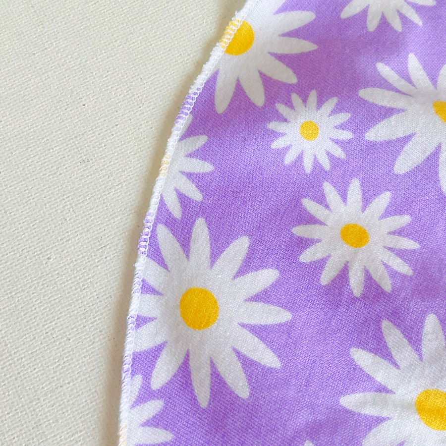 a piece of fabric with an example of rolled hem