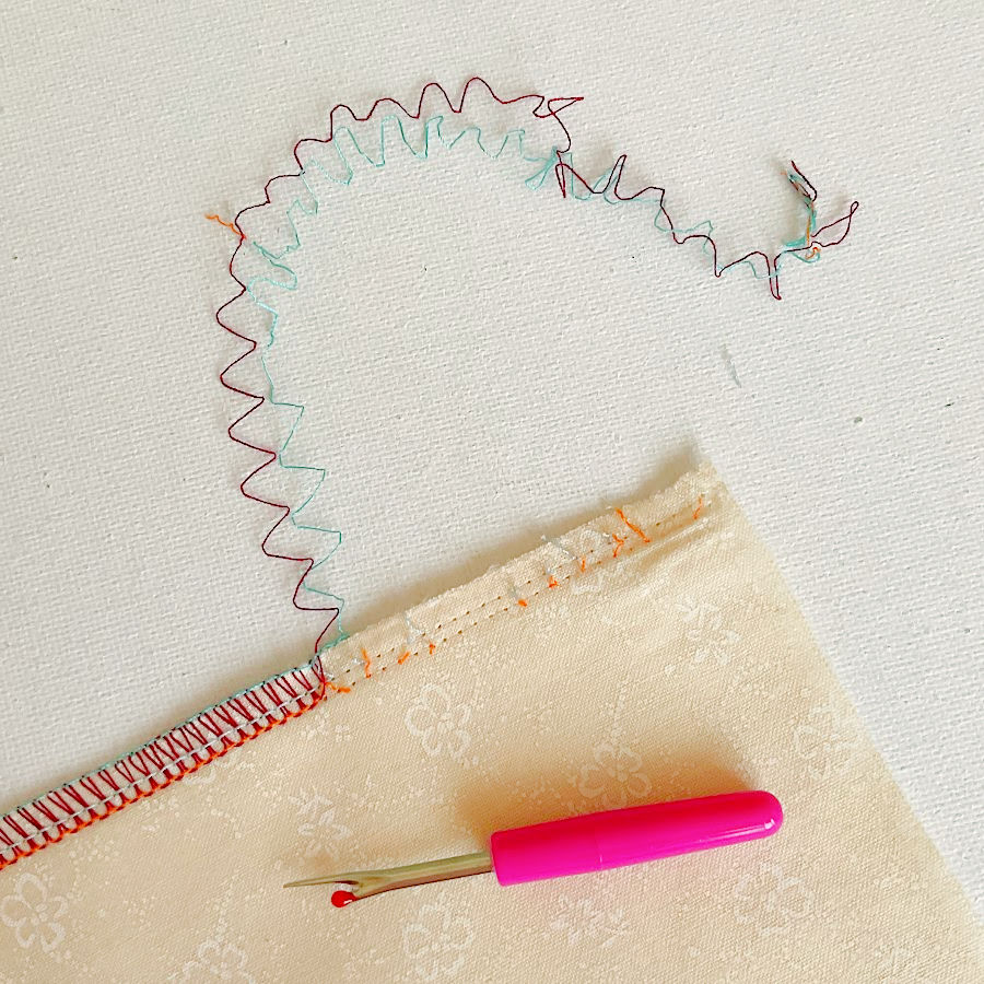 the looper thread comes apart easily after the needle threads are cut from place to place