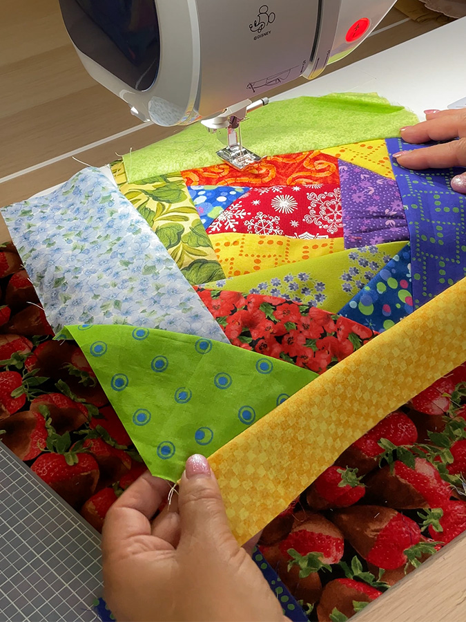 a piece of fabric made out of fabric crumps while being sewn on a sewing machine