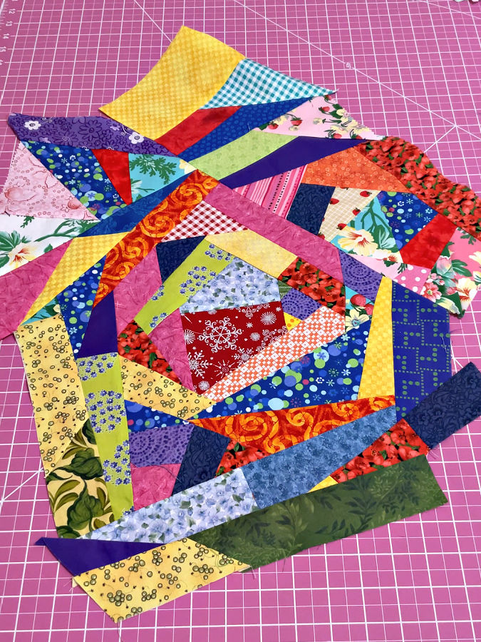 a crumbs panel of indeterminate shape assembled before being trimmed and combined with other panels