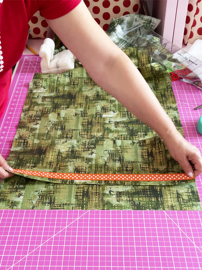 placing the pocket tube on the lining