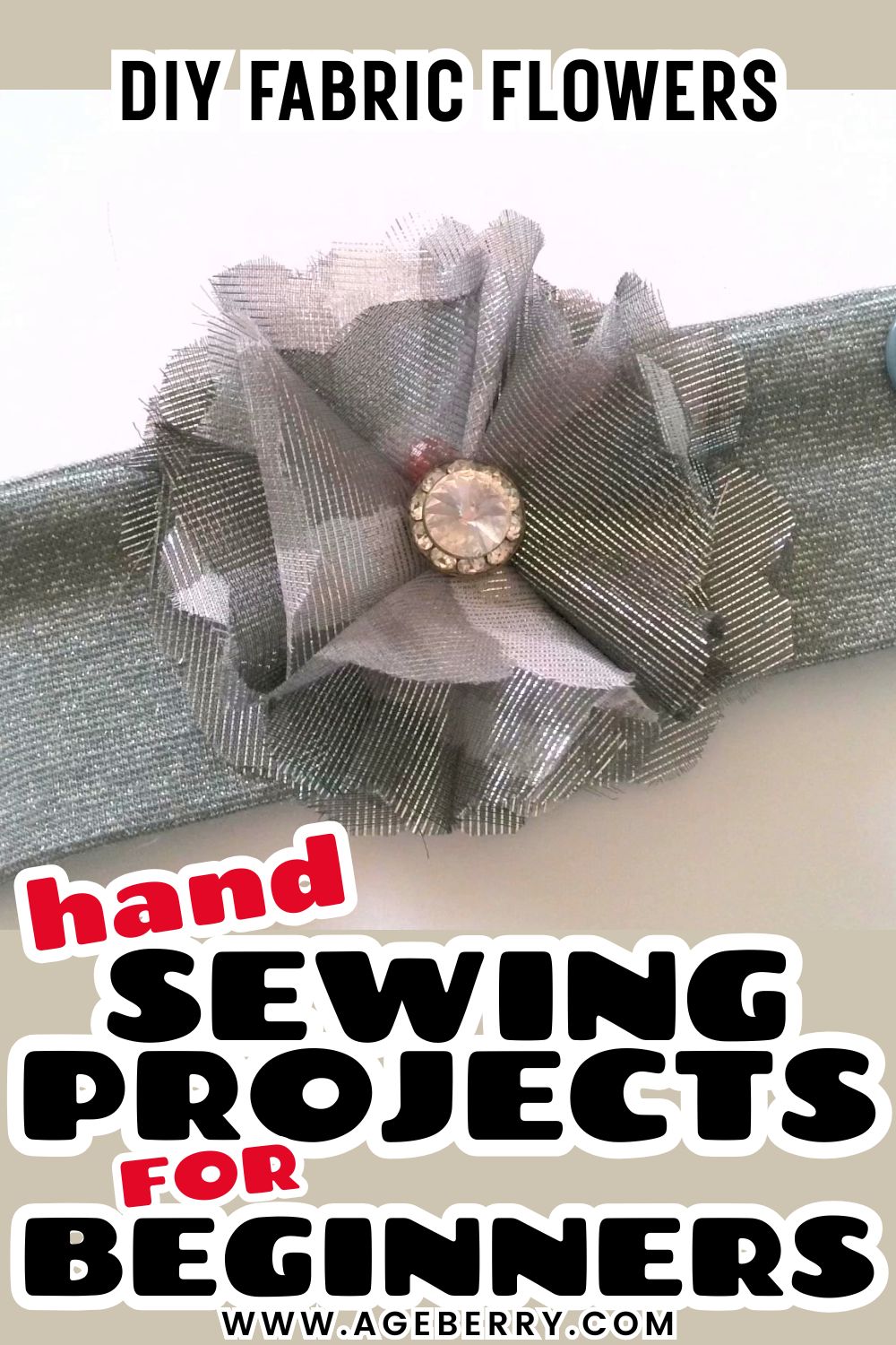 Learn how to make DIY fabric flowers with an easy hand sewing project for beginners. The image shows a handmade fabric flower created from layered sheer gray fabric, centered with a decorative rhinestone and attached to a fabric band. This beginner-friendly hand sewing tutorial is ideal for learning simple stitches and creating fabric flowers for headbands, accessories, or embellishments included in hand sewing projects for beginners.