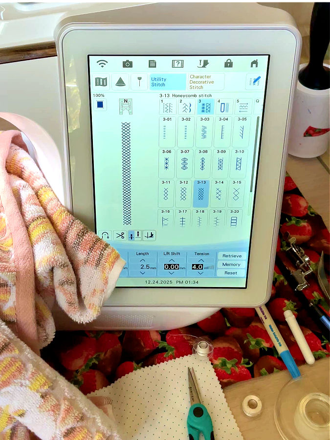 sewing machine screen showing the settings for the stitch used