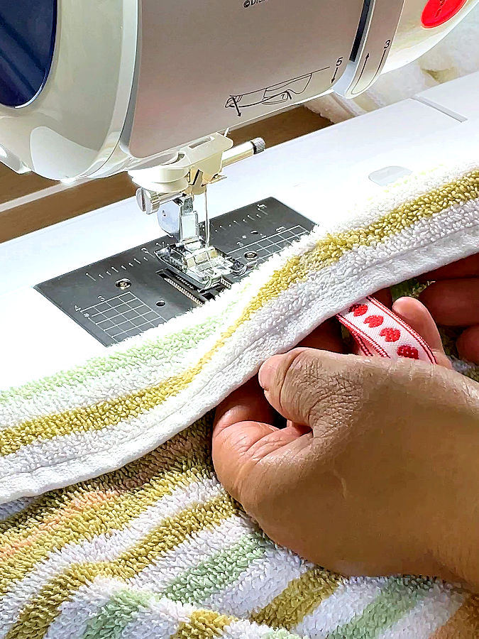 image of the side of the towel opposed to the loop taken after the loop has sewn to the towel
