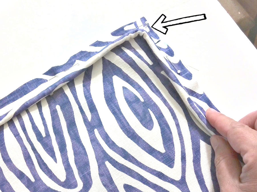 image showing how to clip the piping seam allowance to allow it to bend properly around a sharp corner