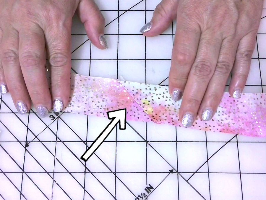 image showing the diagonal seam joining two strips of 1.5 inch fabric