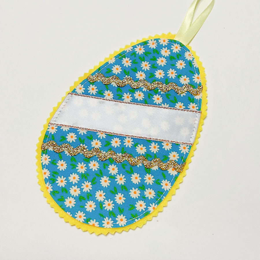 the fabric egg after the back piece of felt was trimmed using pinking shears