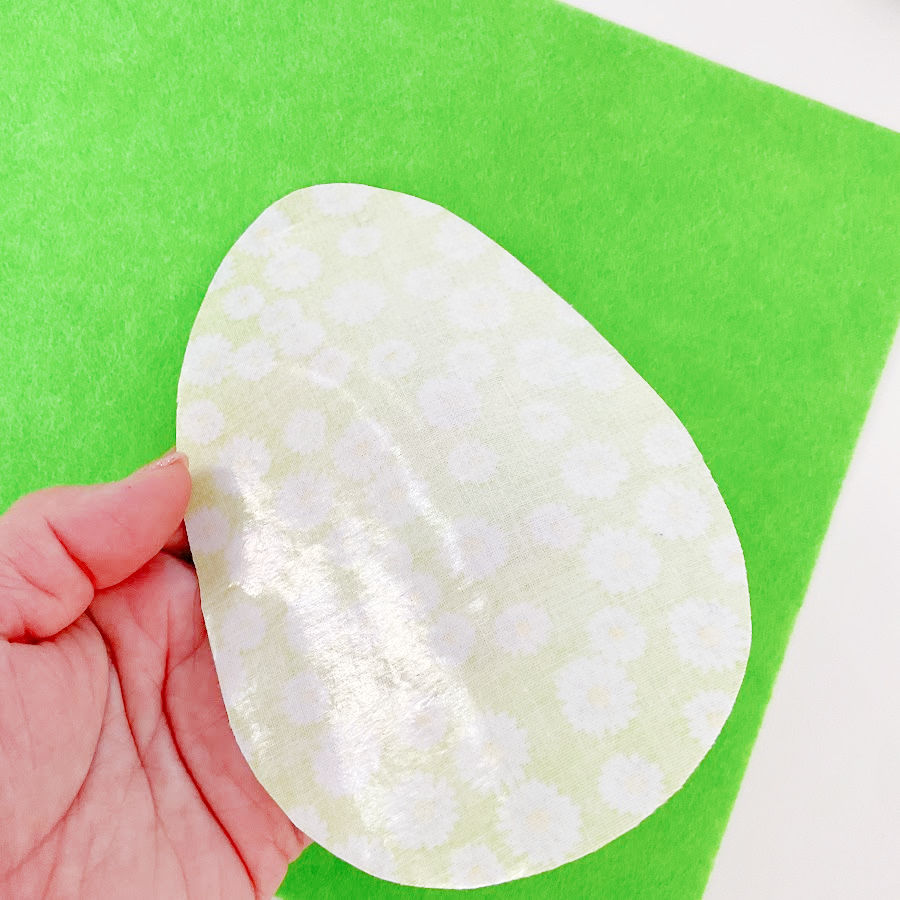 the second adhesive side of the interface is exposed in a womans hand