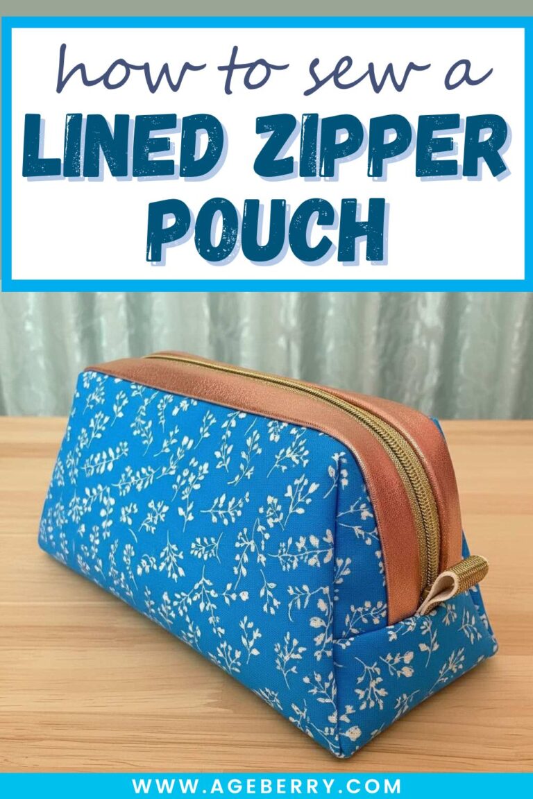 Finished lined zipper pouch in blue floral fabric with a contrasting faux leather zipper panel and gold zipper, shown on a wooden table, illustrating the final result of a step-by-step sewing tutorial.