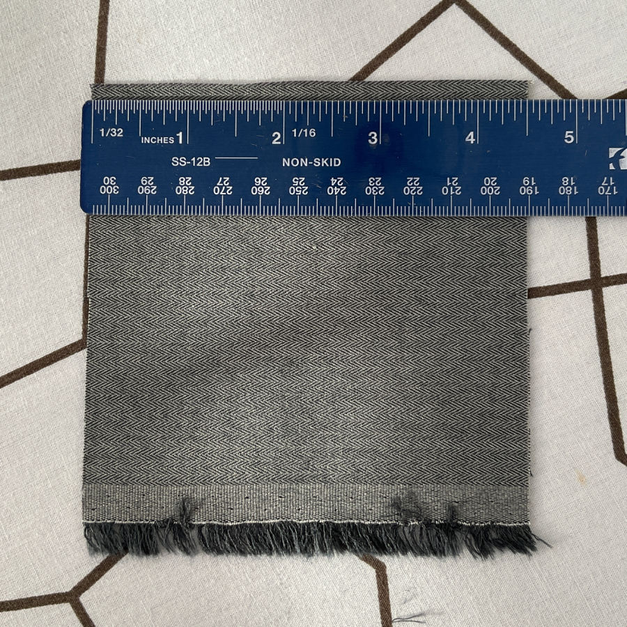 the text square of wool mix fabric before steam pressing the size is exactly 4 1/2 inches
