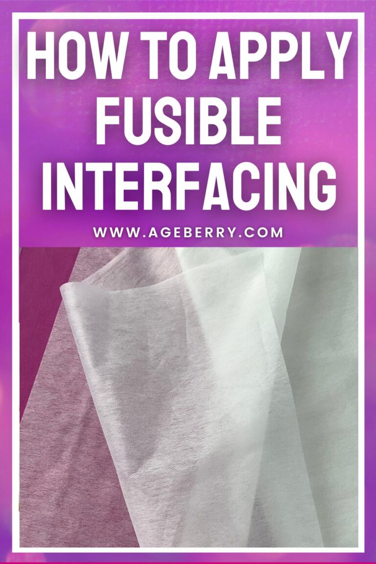 Close-up of several pieces of white and light-colored fusible interfacing layered over pink fabric on a flat surface. The image features a purple gradient background with large white text at the top reading “How to Apply Fusible Interfacing” and the website ageberry.com below. The interfacing sheets are slightly translucent, showing texture and thickness differences