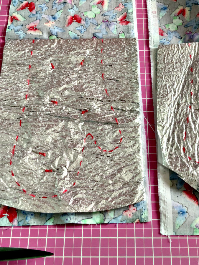 the construction stack for the oven mitt after marking of the mitt shape