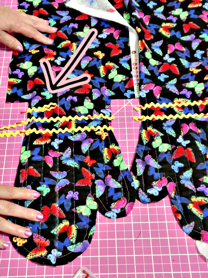 attaching the trim and hanging loop to the oven mitt
