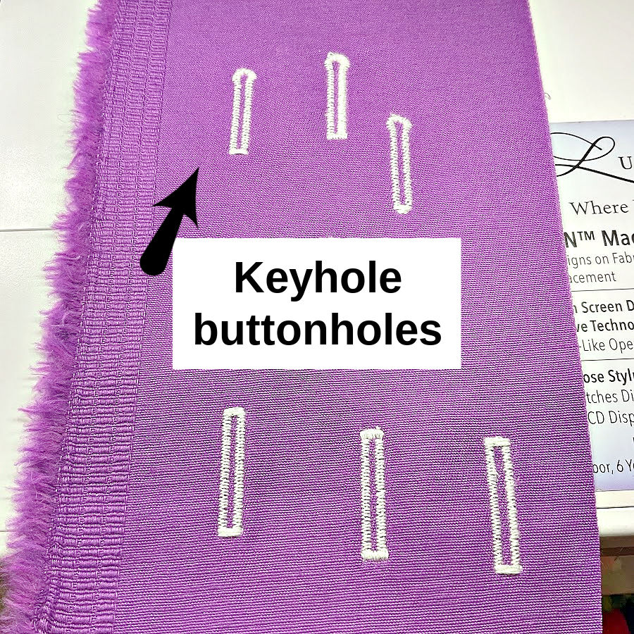 Purple fabric sample labeled “Keyhole buttonholes,” with an arrow pointing to one example.