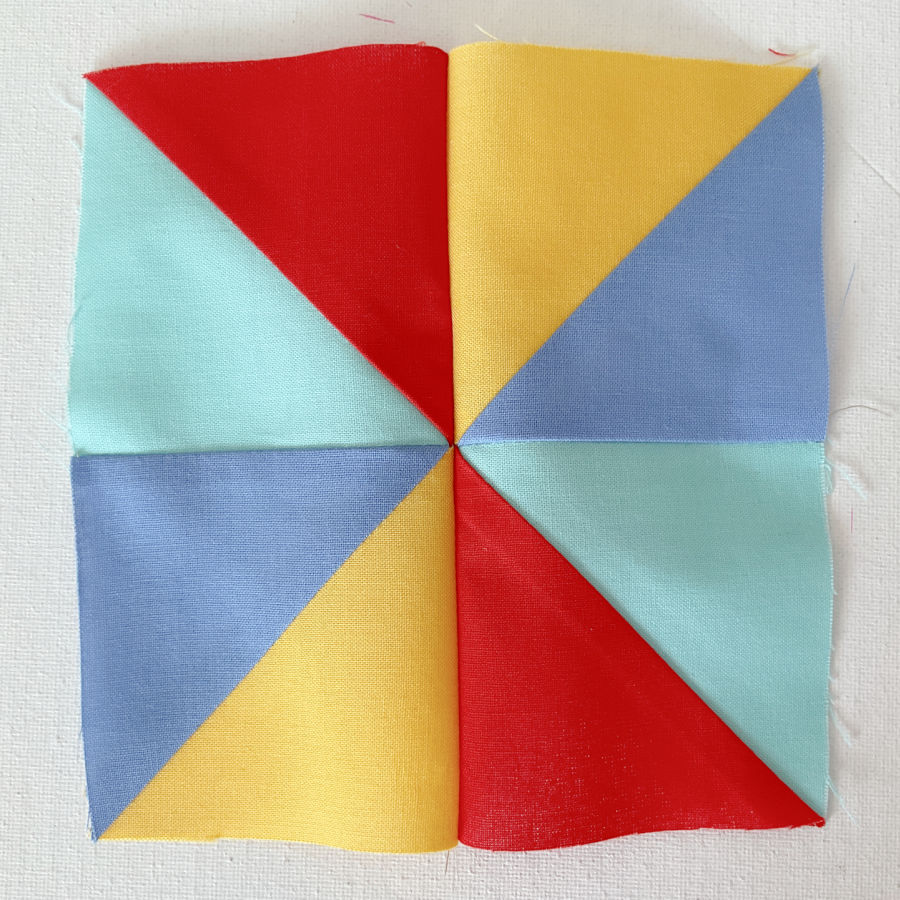 the block after sewing does not look flay yet but the pinwheel is defined well