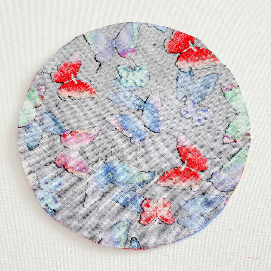 the fabric circle for the back of the jar opener it will be under the non slip material being used and almost invisible