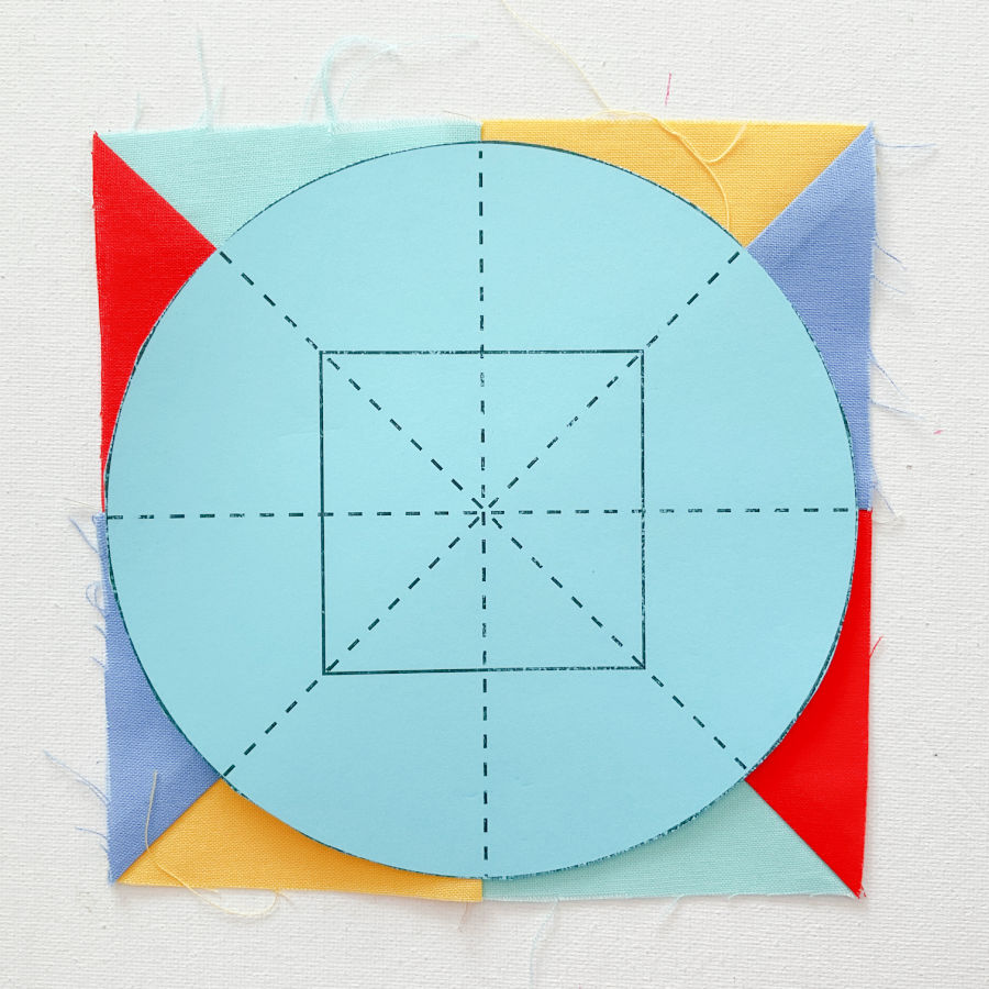 arranging the circular template on the block in preparation for cutting the center of the circle must match the center of the block