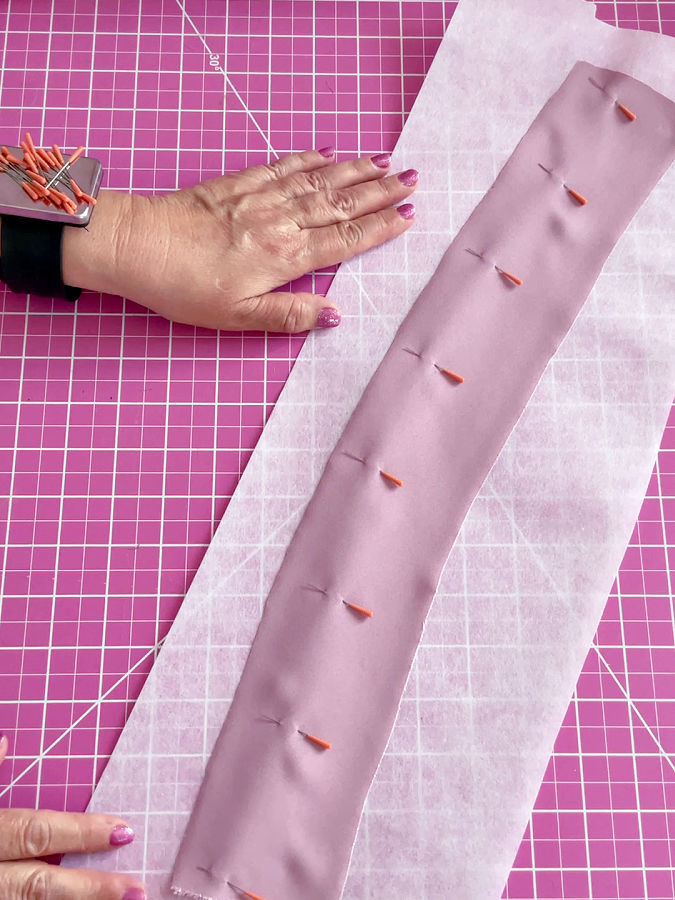 the material is pinned to the stabilizer strip