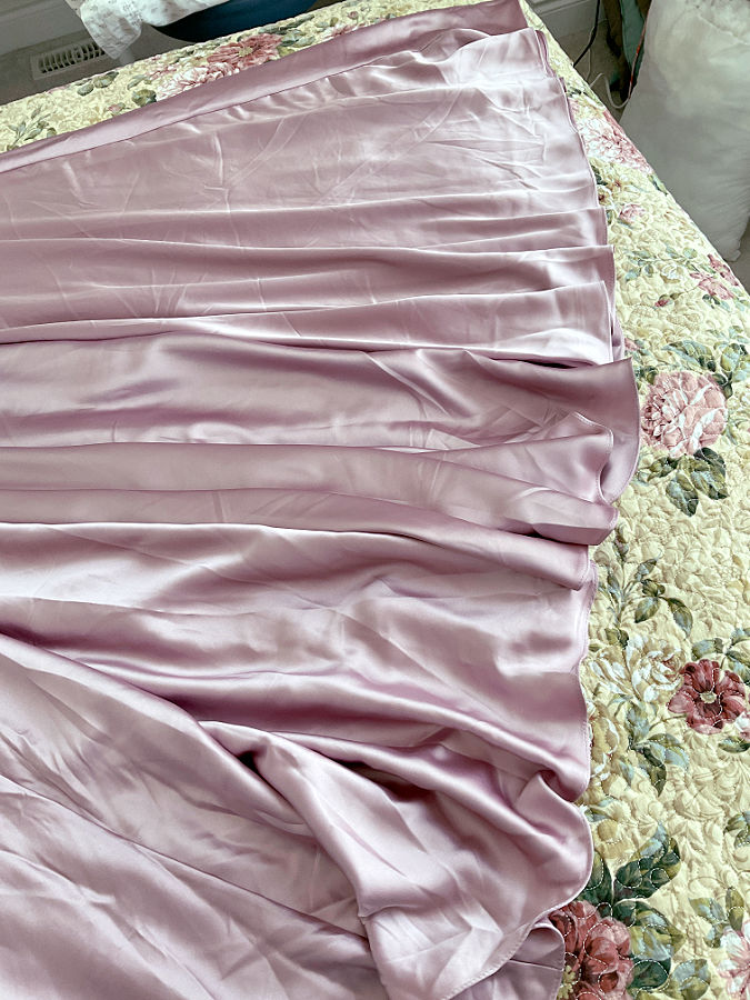 image of the skirt to be hemmed before cutting to the proper length the full skirt is very big only part of the skirt fits in the image