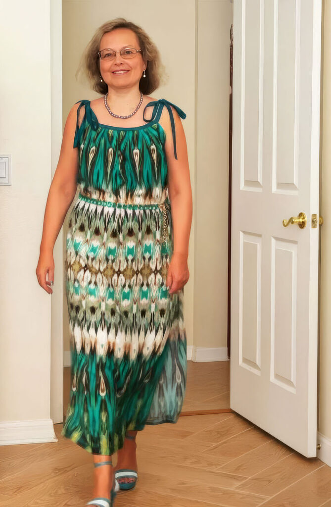 a woman dressed in a long dress made without a pattern