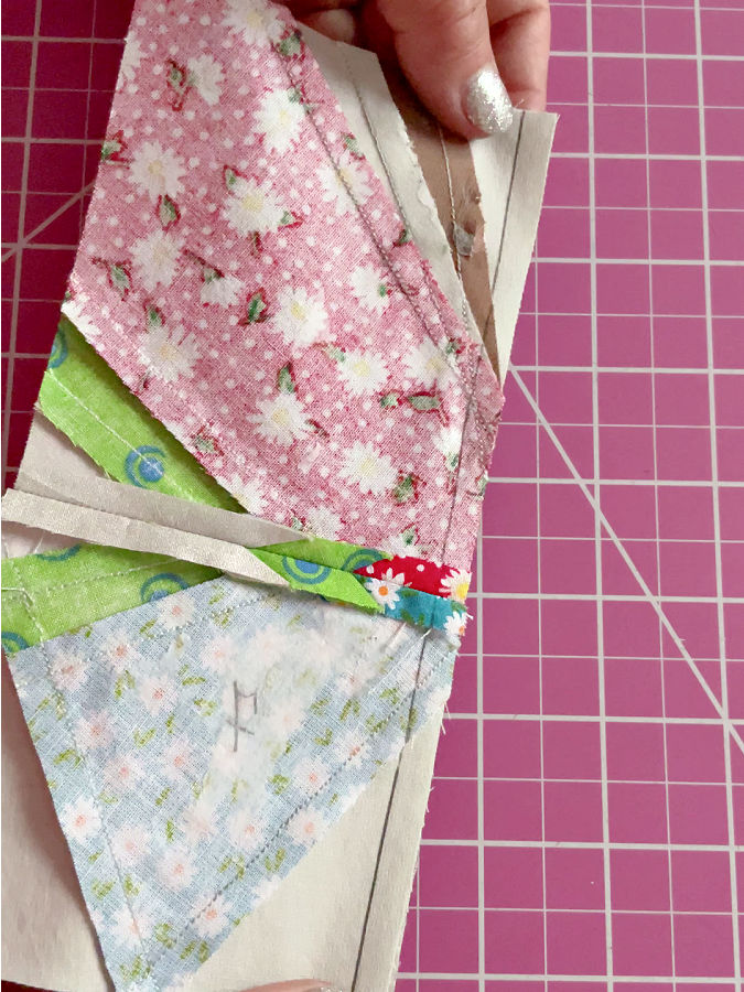 two of the the final blocks sewn together the upper wing section and the lower wing section seen from the wrong side