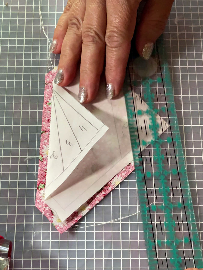 after the stitch the seam allowance is trimmed to 1/4 of an inch