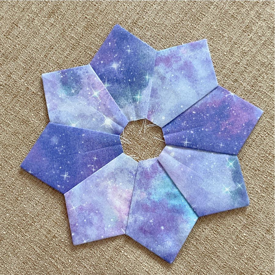 the full eight dresden blades sewn together in a dresden plate circle the center is still open