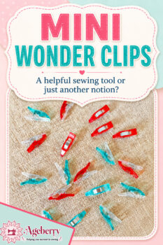 Red and teal Clover Mini Wonder Clips scattered on textured fabric with text reading Mini Wonder Clips, a helpful sewing tool or just another notion?