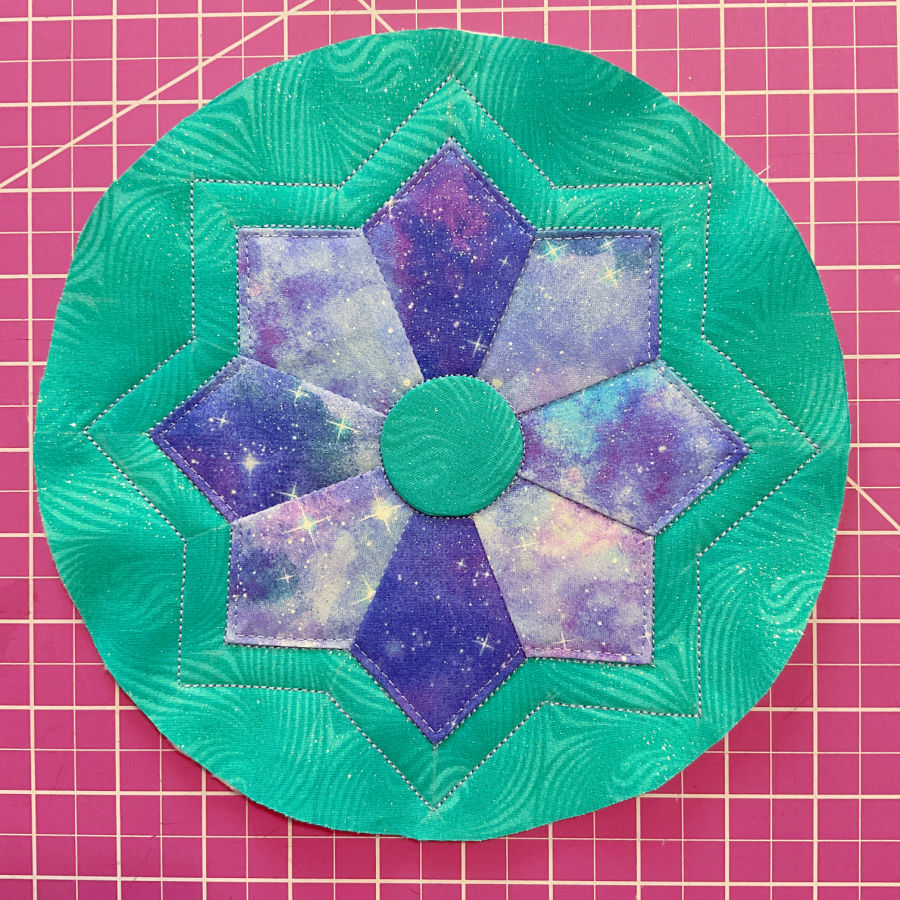 the front of the purse with al layers quilted together