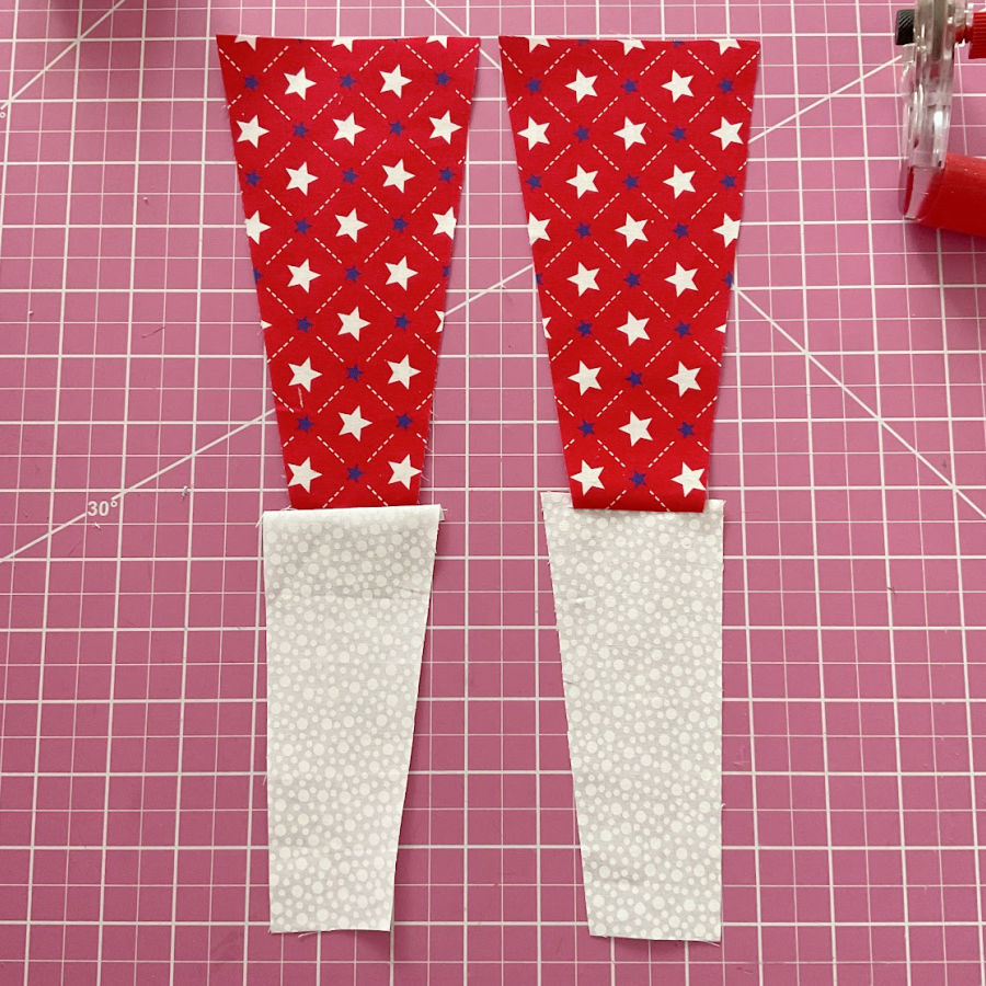the red/white pieces shown after sewing and pressing the seam allowances