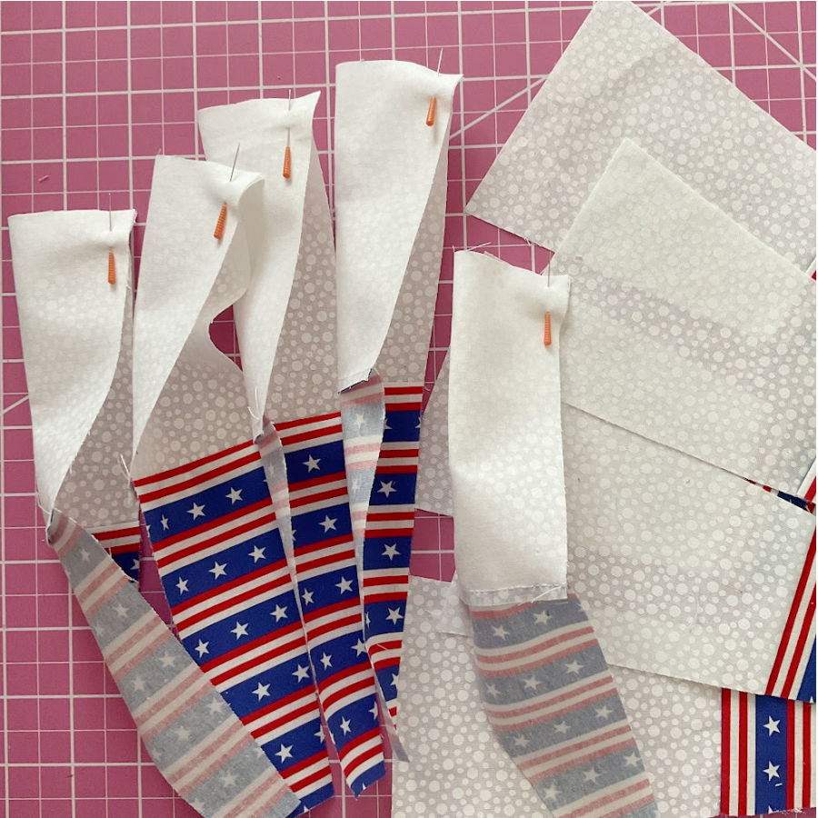 the blue blades folded at the wide edge and pinned