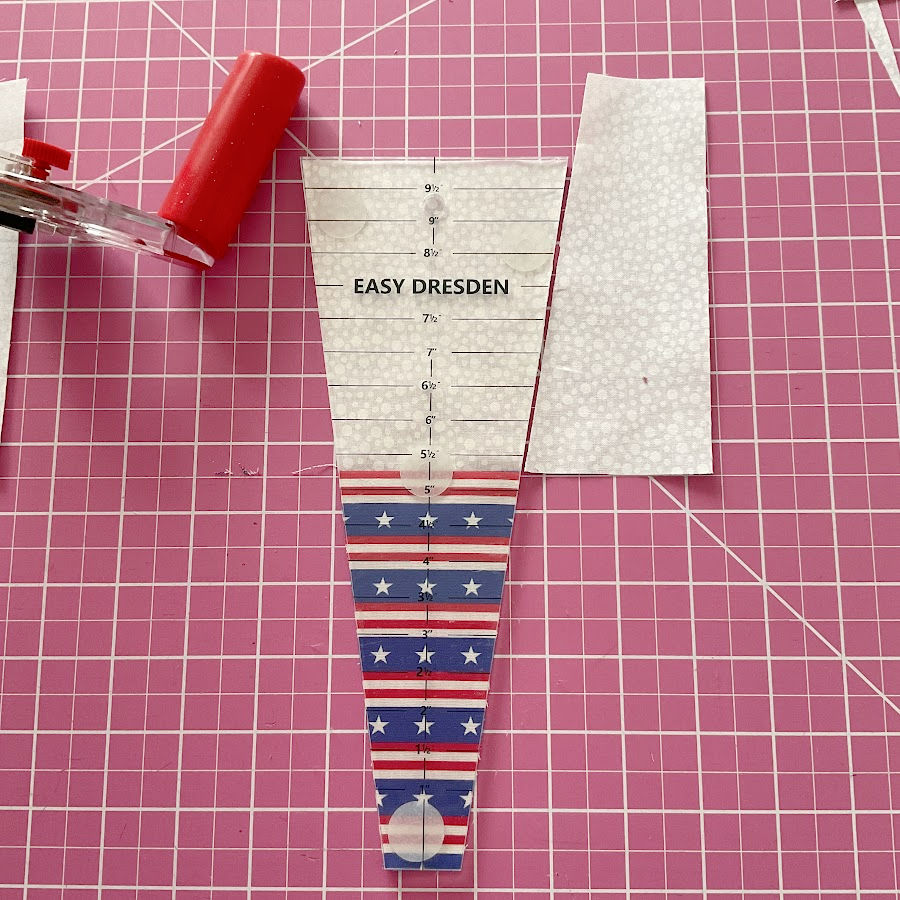 the blue/white piece after cutting using the dresden ruler as pattern