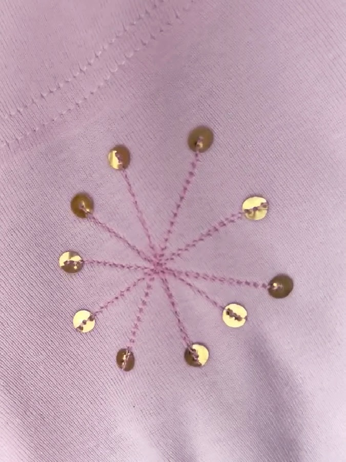 the ornamental design after finishing sewing all sequins