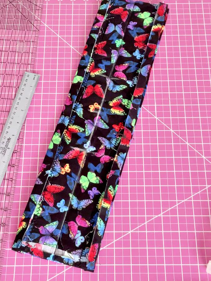 the potholder after stitching the center line on the mark made before